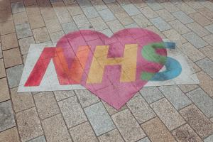 Photo of NHS logo artwork.
